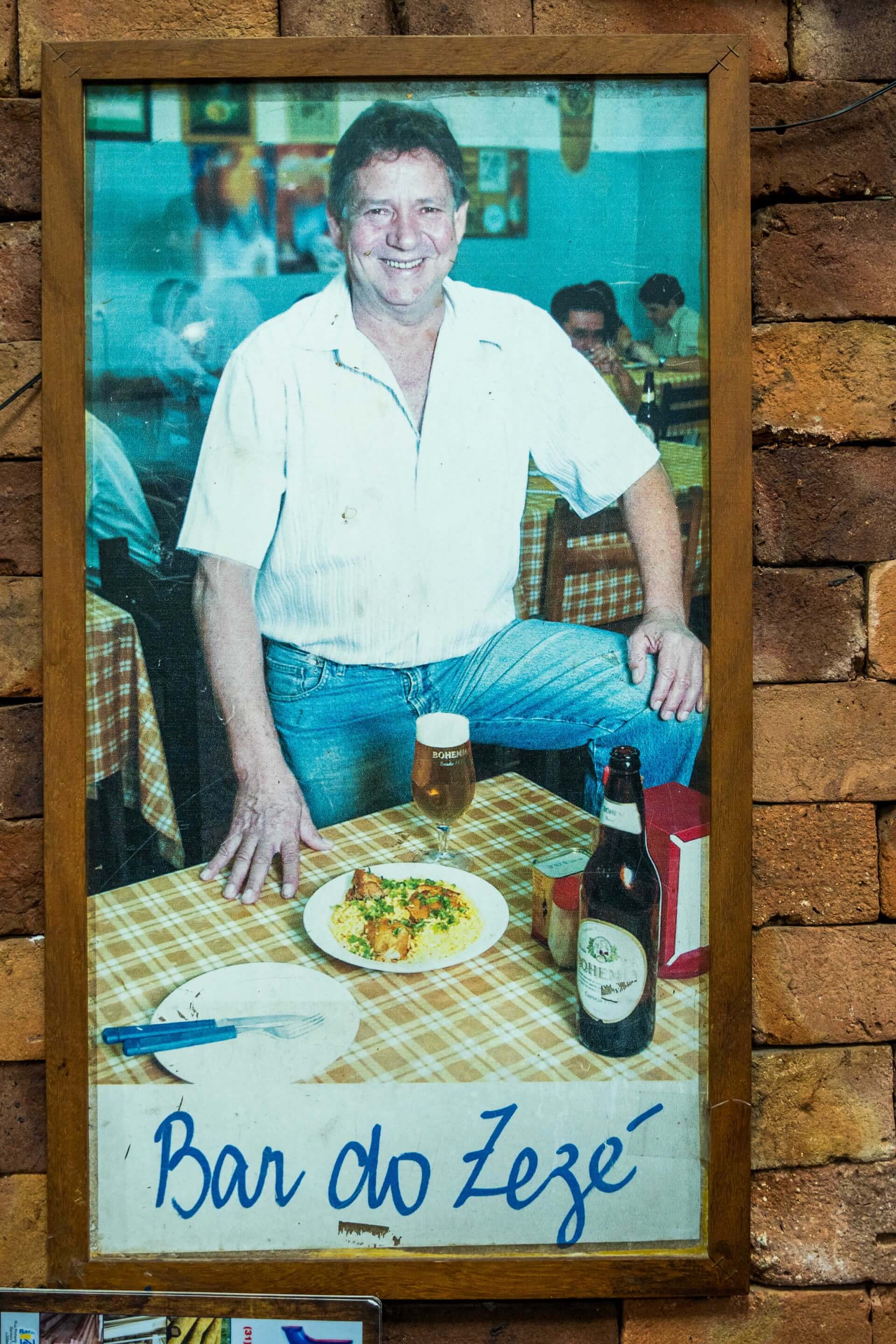 Foto do dono do Bar em um quadro