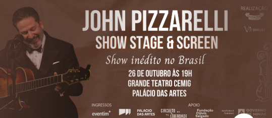 Imagem com um homem segurando o violão e sorrindo 