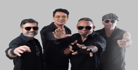 imagem dos integrantes da banda vestidos de preto 