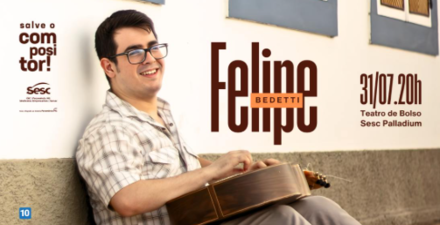 Imagem do cantor com o violão no colo 