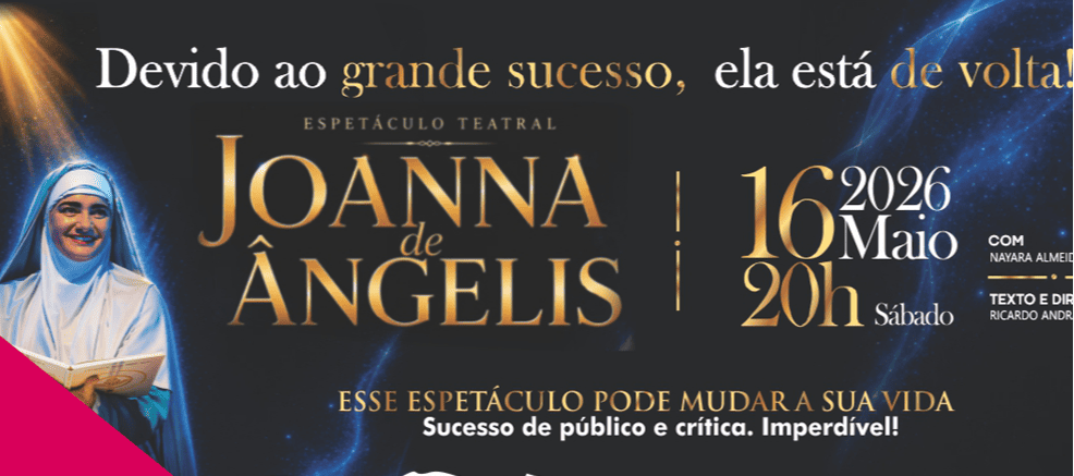 Banner horizontal com fundo escuro e efeitos de luz azul e dourada. À esquerda, uma mulher vestida de freira sorri e segura um livro aberto. No centro, o título em letras douradas: "JOANNA DE ÂNGELIS - ESPETÁCULO TEATRAL". À direita, as informações do evento: "16 de Maio de 2026 às 20h, Sábado". O texto superior diz: "Devido ao grande sucesso, ela está de volta!", e o inferior destaca: "Esse espetáculo pode mudar a sua vida". No canto inferior esquerdo, há um detalhe triangular rosa.