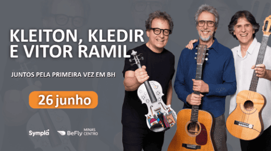 O anúncio apresenta um fundo cinza com marcas d'água das silhuetas dos próprios artistas. À direita, os três músicos aparecem sorridentes, em pé e lado a lado, segurando seus respectivos instrumentos acústicos: um violino decorado com desenhos coloridos, um violão e um violão de náilon menor. À esquerda, o texto em letras garrafais brancas destaca o nome do trio e a frase "JUNTOS PELA PRIMEIRA VEZ EM BH". Logo abaixo, a data "26 junho" ganha destaque dentro de um botão oval laranja, com os logotipos da Symp