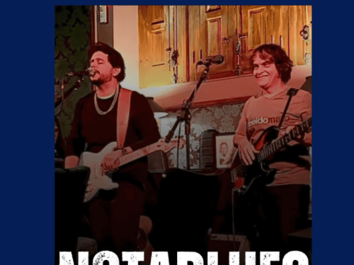 Dois homens segurando instrumentos de corda (guitarra e baixo)