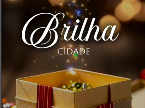 uma caixa com luzes saindo escrito BRILHA CIDADE 