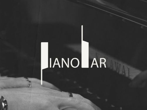 Foto em preto e branco de mãos tocando piano