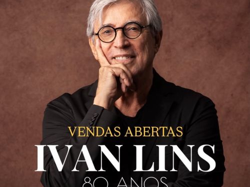 Pôster do show de Ivan Lins, em comemoração aos seus 80 anos. O músico aparece em destaque, sorrindo e usando óculos. O evento acontecerá no dia 23 de maio, no Befly Minascentro, em Belo Horizonte. Abaixo, o texto informa "Vendas Abertas" pela plataforma Sympla.