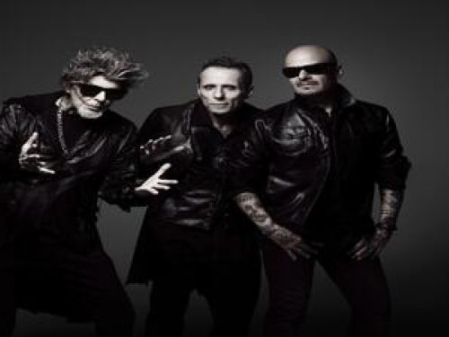 Imagem dos três membros da banda os titãs 