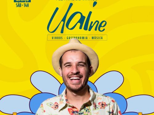 Cartaz com fundo amarelo e elementos gráficos coloridos. No centro, há a foto de um homem sorridente, usando chapéu de palha e camisa florida. Abaixo dele, o texto em destaque: "BAILE DO MAGUÁ".