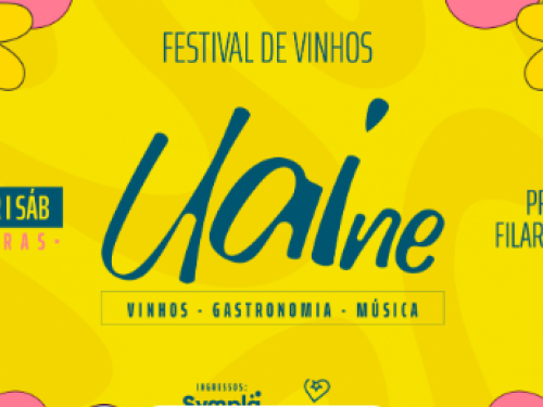 Cartaz digital com fundo amarelo vibrante e ilustrações coloridas de flores e garrafas de vinho. No centro, destaca-se a palavra "Uaine" em letras cursivas azuis. Acima, o título "FESTIVAL DE VINHOS" e, abaixo, os pilares do evento: Vinhos, Gastronomia e Música.