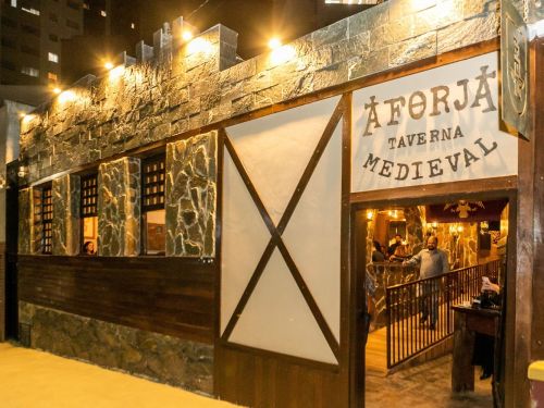 Foto da entrada da Taverna 