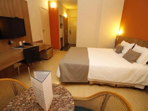 Quarto do Actuall Convention by Summit Hotels