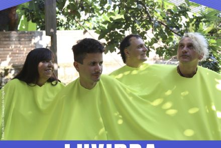 Cartaz divulgação com fundo lilás e fotografia do grupo LUVIBRA, textos em letra branca informando o line up, data, horário.