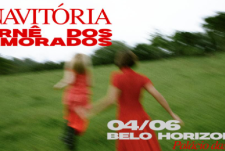 Cartaz do show ANAVITÓRIA - Turnê dos Namorados 2026. A imagem, com efeito de movimento e desfoque, mostra as duas artistas de costas, usando vestidos vermelhos e correndo em um campo verde. No canto superior esquerdo, o nome da turnê em letras vermelhas. No canto inferior direito, as informações do evento: 04/06 em Belo Horizonte, no Palácio das Artes.